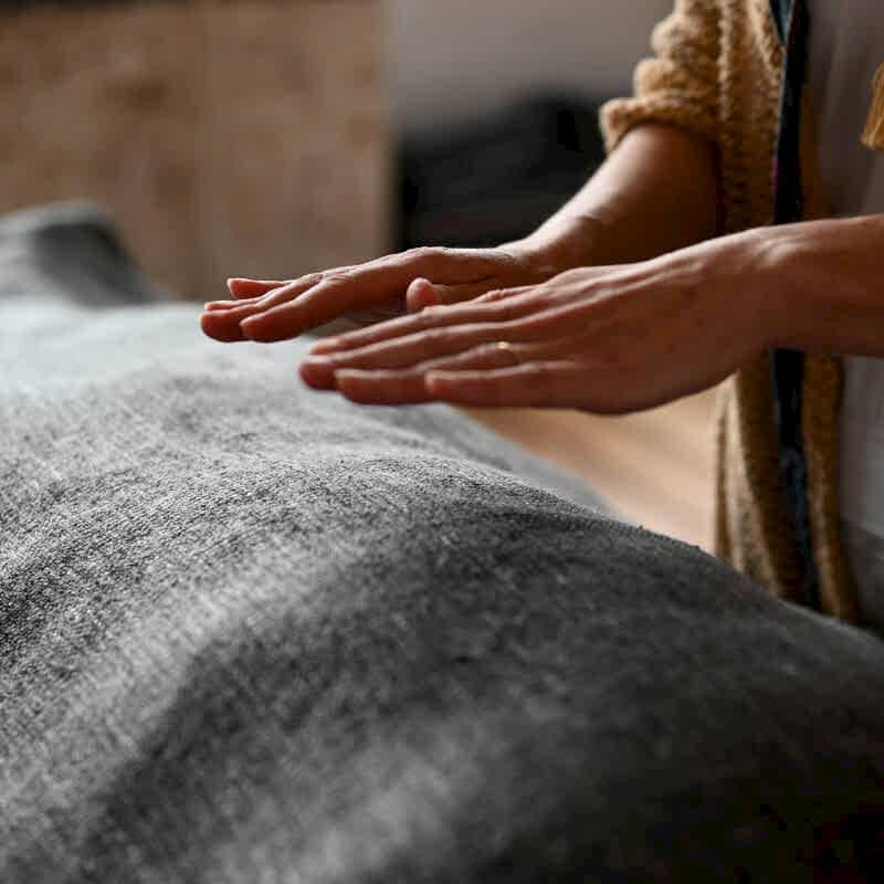 Anja Lenka Reiki Level 1 + 2 Anja Lenka giving Reiki to a patient